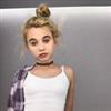 Little girl's Instagram account where she poses with tongue hanging out, wearing chokers, features multiple signs of degeneracy including Hugh Hefner