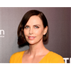 Hollyweird Child Abuser Charlize Theron opens up about raising her son as a girl