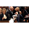 Theories on this old video? What was in the envelopes at Bush Sr's funeral?
