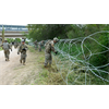 US troops seen setting up barbed wire near Mexico border